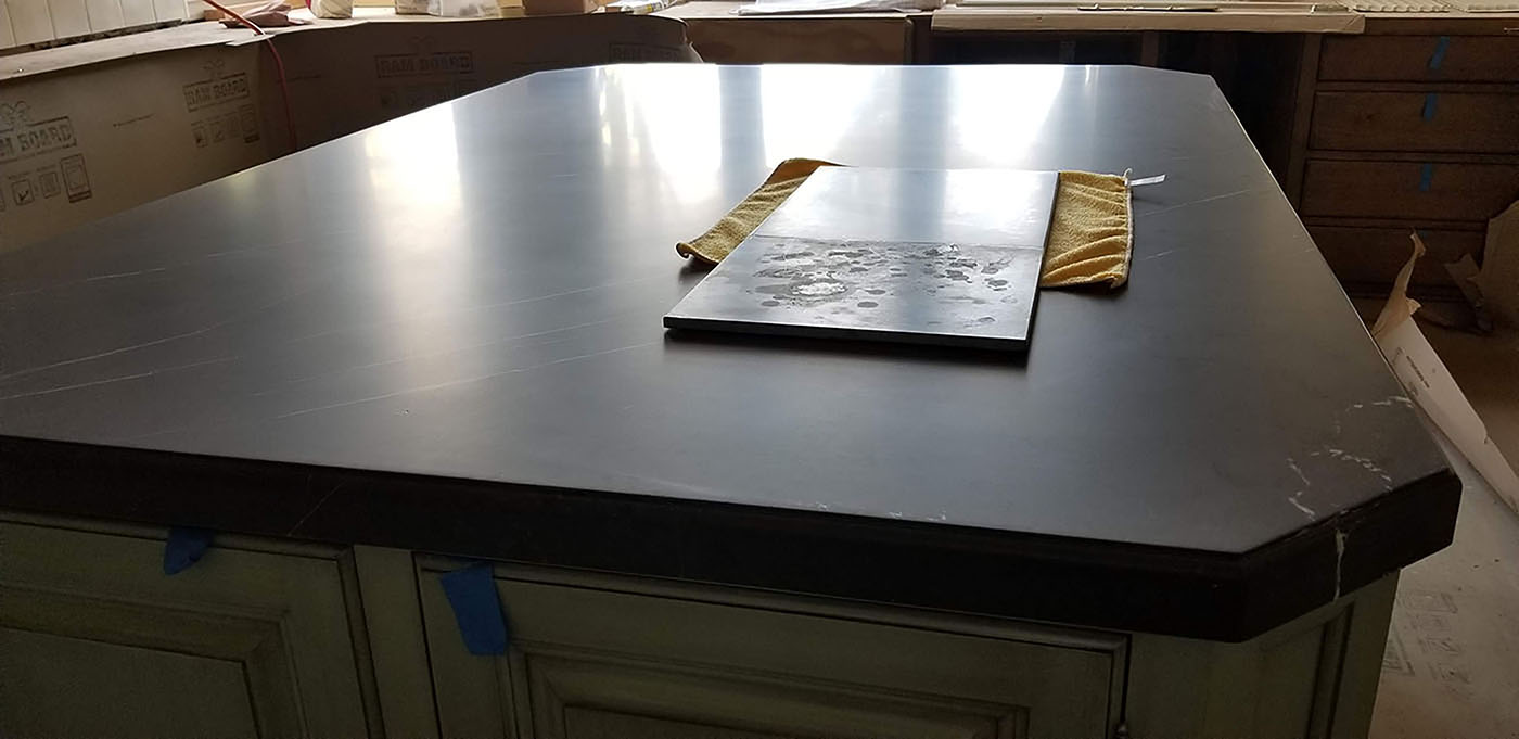 Marble countertop with AntiEtch® demo, showing etch protection results in Los Angeles.